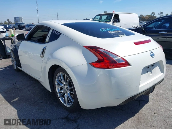 2018 Nissan 370Z Sport with VIN JN1AZ4EH3JM571169, listed as a IAAI auction lot 41859730 with 85,428 mi miles and . Bid and sale history available at DreamBid. Image 3.