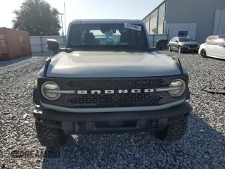 2024 Ford Bronco Wildtrak с VIN 1FMEE2BPXRLB16732, выставлен на аукционе Copart как лот 56394005 с пробегом 8 428 миль миль и Списание • Salvage title. История ставок и продаж доступна на DreamBid. Изображение 5.