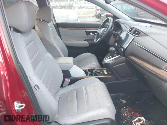 2020 Honda CR-V Touring with VIN 2HKRW2H96LH659793, listed as a IAAI auction lot 41145758 with 113,344 mi miles and . Bid and sale history available at DreamBid. Image 5.