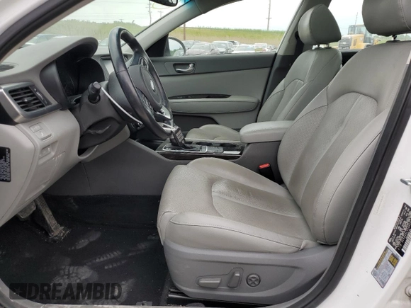 2016 Kia Optima EX z VIN 5XXGU4L3XGG091612, wystawiony jako Copart lot #59929295 z przebiegiem 130 450 mil mil oraz Szkoda całkowita • Salvage title. Historia ofert i sprzedaży dostępna na DreamBid. Obrazek 7.