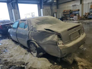 2002 Cadillac DeVille DTS with VIN 1G6KF57912U199809, listed as a Copart auction lot 87372504 with 154,663 mi miles and Salvage Title. Bid and sale history available at carsss.com. Image 2.