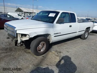 1999 Dodge Ram 1500 with VIN 1B7HC13Y4XJ627063, listed as a IAAI auction lot 41697073 with 206,776 mi miles. Bid and sale history available at carsss.com. Image 2.