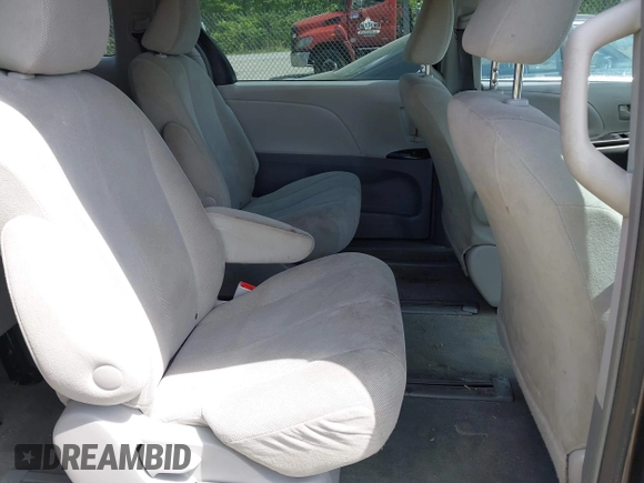 2012 Toyota Sienna with VIN 5TDKA3DCXCS012945, listed as a IAAI auction lot 42190015 with 114,372 mi miles and . Bid and sale history available at DreamBid. Image 8.