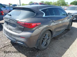 2017 Infiniti QX30 Sport with VIN SJKCH5CP3HA023156, listed as a IAAI auction lot 41870773 with 51,063 mi miles. Bid and sale history available at carsss.com. Image 4.
