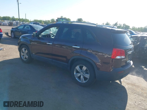 2012 Kia Sorento EX with VIN 5XYKUDA23CG206609, listed as a IAAI auction lot 42142072 with 162,574 mi miles. Bid and sale history available at carsss.com. Image 3.