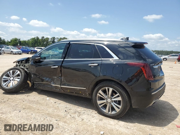 2022 Cadillac XT5 FWD Premium Luxury with VIN 1GYKNCRS0NZ178827, listed as a Copart auction lot 56200975 with 47,774 mi miles and Salvage title. Bid and sale history available at DreamBid. Image 2.