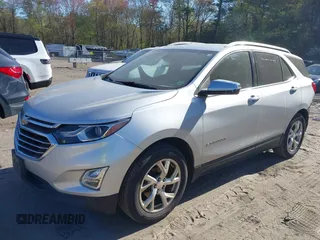2018 Chevrolet Equinox Premier with VIN 3GNAXVEV4JS598239, listed as a IAAI auction lot 42112886 with 142,093 mi miles and . Bid and sale history available at DreamBid. Image 2.