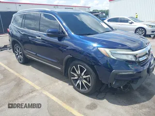 2019 Honda Pilot Touring 8-Passenger with VIN 5FNYF6H95KB011488, listed as a IAAI auction lot 42475765 with 147,145 mi miles and . Bid and sale history available at DreamBid. Image 1.