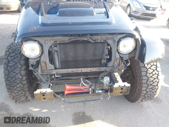 2017 Jeep Wrangler Unlimited Sahara with VIN 1C4BJWEG5HL635319, listed as a IAAI auction lot 42224748 with 141,214 mi miles and . Bid and sale history available at DreamBid. Image 18.