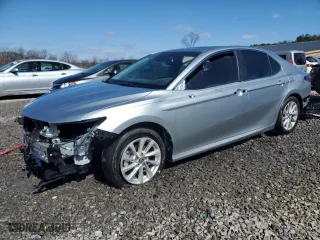 2024 Toyota Camry LE with VIN 4T1R11AK4RU263703, listed as a Copart auction lot 41975785 with 10,128 mi miles and Salvage Title. Bid and sale history available at carsss.com. Image 1.
