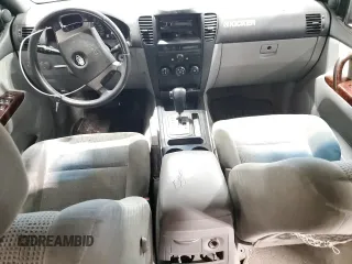 2005 Kia Sorento LX z VIN KNDJC733X55368884, wystawiony jako Copart lot #54858715 z przebiegiem 136 993 mil mil oraz Szkoda całkowita • Salvage title. Historia ofert i sprzedaży dostępna na DreamBid. Obrazek 8.