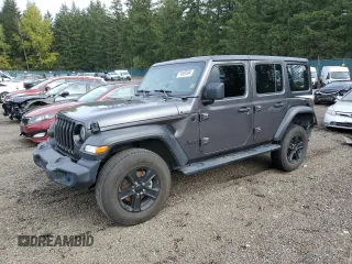 2021 Jeep Wrangler Unlimited 80th Anniversary with VIN 1C4HJXDNXMW779537, listed as a Copart auction lot 74969594 with 50,816 mi miles and Salvage Title. Bid and sale history available at DreamBid. Image 1.