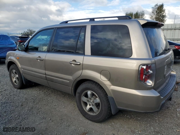 2006 Honda Pilot EX-L with VIN 5FNYF28586B048997, listed as a Copart auction lot 71120924 with 215,080 mi miles and Salvage Title. Bid and sale history available at carsss.com. Image 2.