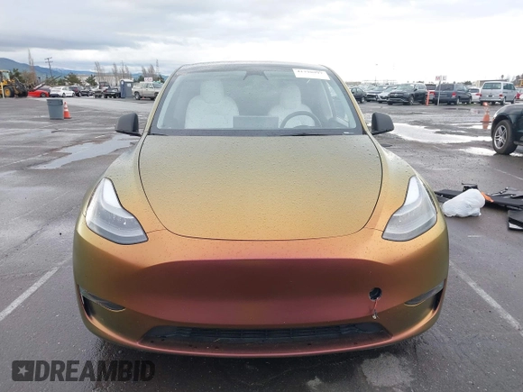 2023 Tesla Model Y Performance with VIN 7SAYGDEF4PF738885, listed as a IAAI auction lot 41798997 with 59,270 mi miles and . Bid and sale history available at DreamBid. Image 13.