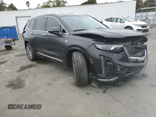 2022 Cadillac XT6 Premium Luxury with VIN 1GYKPDRS5NZ110989, listed as a Copart auction lot 69600894 with 56,148 mi miles and Salvage Title. Bid and sale history available at carsss.com. Image 4.
