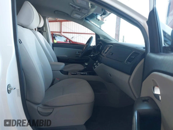 2021 Kia Sedona LX with VIN KNDMB5C15M6669588, listed as a IAAI auction lot 41757129 with 14,738 mi miles. Bid and sale history available at carsss.com. Image 5.