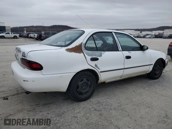 1997 Geo Prizm z VIN 1Y1SK526XVZ437486, wystawiony jako Copart lot #86422384 z przebiegiem 404 485 mil mil oraz Tytuł czysty. Historia ofert i sprzedaży dostępna na DreamBid. Obrazek 3.