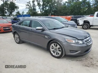 2011 Ford Taurus Limited with VIN 1FAHP2FW3BG184887, listed as a Copart auction lot 60717875 with 196,102 mi miles and Salvage title. Bid and sale history available at DreamBid. Image 4.