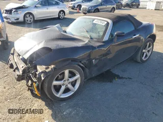 2009 Pontiac Solstice z VIN 1G2MN35B09Y101640, wystawiony jako Copart lot #48529945 z przebiegiem 167 149 mil mil oraz Szkoda całkowita • Salvage title. Historia ofert i sprzedaży dostępna na DreamBid. Obrazek 1.