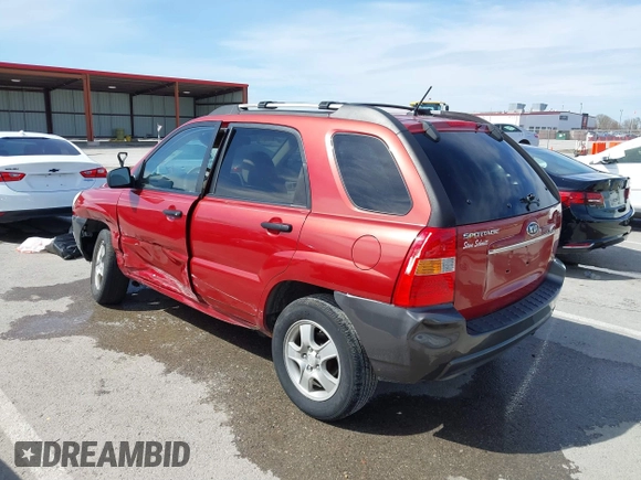 2007 Kia Sportage LX with VIN KNDJF724577371572, listed as a IAAI auction lot 41817960 with 213,062 mi miles. Bid and sale history available at carsss.com. Image 14.