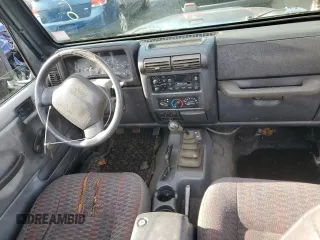 2000 Jeep Wrangler Sport with VIN 1J4FA49S2YP803165, listed as a Copart auction lot 85611904 with 192,427 mi miles and Non repairable. Bid and sale history available at DreamBid. Image 8.