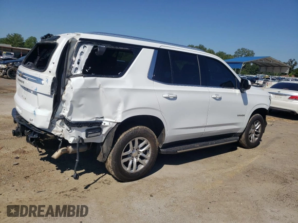 2021 Chevrolet Tahoe LT with VIN 1GNSCNKD4MR252131, listed as a Copart auction lot 69876114 with 99,192 mi miles and Salvage title. Bid and sale history available at DreamBid. Image 3.