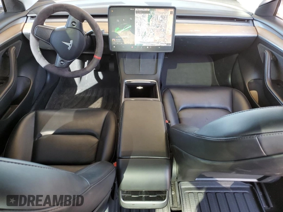 2021 Tesla Model 3 Standard Range Plus with VIN 5YJ3E1EA7MF978749, listed as a Copart auction lot 43377955 with 51,871 mi miles and Salvage Title. Bid and sale history available at carsss.com. Image 8.