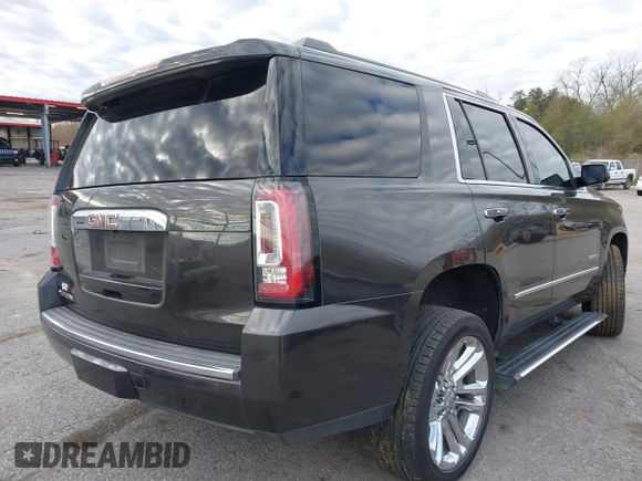 2017 GMC Yukon Denali with VIN 1GKS1CKJ0HR153941, listed as a IAAI auction lot 41300648 with 128,193 mi miles. Bid and sale history available at carsss.com. Image 4.