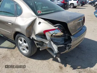2002 Ford Taurus SES Standard with VIN 1FAFP55U52A156214, listed as a IAAI auction lot 41803668 with 31,693 mi miles. Bid and sale history available at carsss.com. Image 6.