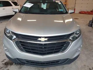 2019 Chevrolet Equinox LT z VIN 3GNAXJEV9KS633657, wystawiony jako IAAI lot #42379968 z przebiegiem 75 398 mil mil oraz . Historia ofert i sprzedaży dostępna na DreamBid. Obrazek 6.