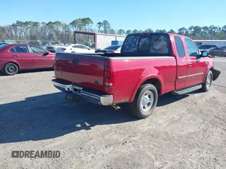 2002 Ford F-150 XL with VIN 1FTRX17W62NB13010, listed as a IAAI auction lot 41689466 with 208,160 mi miles. Bid and sale history available at carsss.com. Image 4.