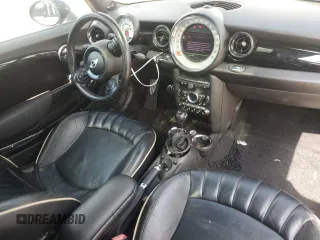 2012 MINI Hardtop S with VIN WMWSV3C50CTY18637, listed as a Copart auction lot 57771015 with 103,402 mi miles and Salvage title. Bid and sale history available at DreamBid. Image 8.