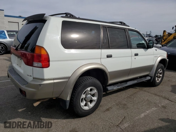 1999 Mitsubishi Montero LS z VIN JA4LS31H2XP037110, wystawiony jako Copart lot #45447485 z przebiegiem 166 942 mil mil oraz Szkoda całkowita • Salvage title. Historia ofert i sprzedaży dostępna na DreamBid. Obrazek 3.