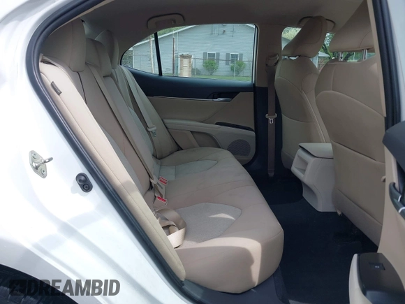 2019 Toyota Camry LE z VIN 4T1B11HK8KU819721, wystawiony jako IAAI lot #42127411 z przebiegiem 101 333 mil mil oraz . Historia ofert i sprzedaży dostępna na DreamBid. Obrazek 8.