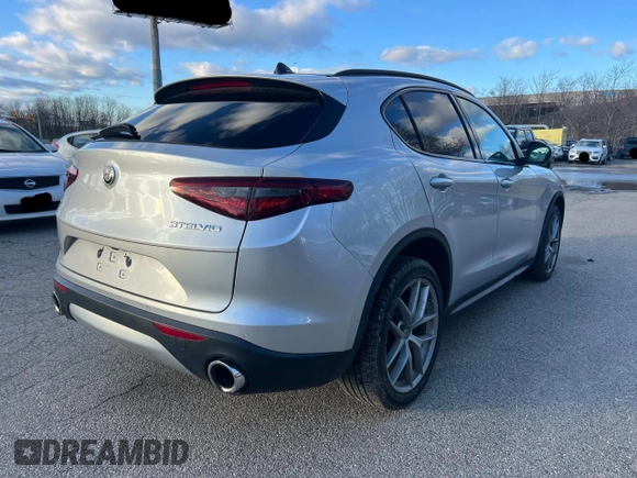 2018 Alfa Romeo Stelvio Ti Sport z VIN ZASFAKNN6J7B87980, wystawiony jako Copart lot #52651205 z przebiegiem 55 662 mil mil oraz Czysty tytuł • Clean title. Historia ofert i sprzedaży dostępna na DreamBid. Obrazek 4.