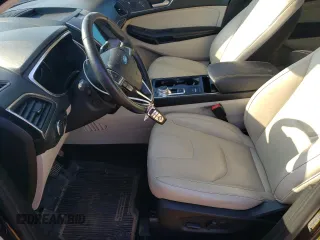 2020 Ford Edge Titanium с VIN 2FMPK3K90LBB63624, выставлен на аукционе Copart как лот 55143825 с пробегом 105 394 миль миль и Списание • Salvage title. История ставок и продаж доступна на DreamBid. Изображение 7.