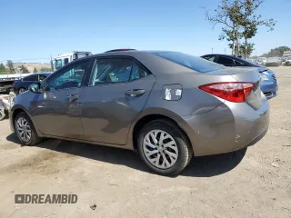 2018 Toyota Corolla L z VIN 2T1BURHE8JC097263, wystawiony jako Copart lot #57715595 z przebiegiem 78 598 mil mil oraz Szkoda całkowita • Salvage title. Historia ofert i sprzedaży dostępna na DreamBid. Obrazek 2.