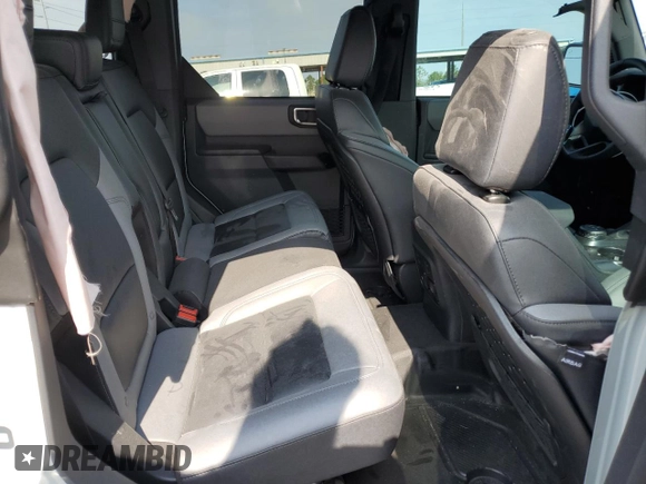 2024 Ford Bronco Big Bend z VIN 1FMDE7BH9RLB23320, wystawiony jako Copart lot #55490395 z przebiegiem 2 225 mil mil oraz Szkoda całkowita • Salvage title. Historia ofert i sprzedaży dostępna na DreamBid. Obrazek 11.