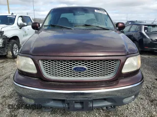2000 Ford F-150 XL with VIN 1FTRX18WXYNB79888, listed as a Copart auction lot 46323685 with 143,904 mi miles and Salvage Title. Bid and sale history available at carsss.com. Image 5.