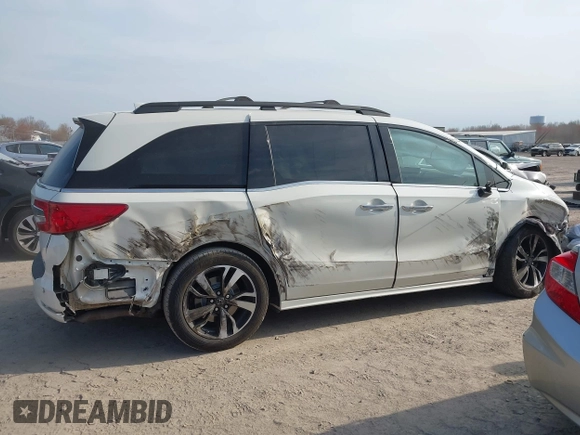 2019 Honda Odyssey Elite with VIN 5FNRL6H90KB019835, listed as a IAAI auction lot 42054752 with 110,659 mi miles and . Bid and sale history available at DreamBid. Image 13.