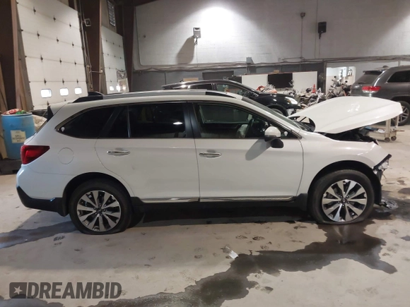 2019 Subaru Outback Touring with VIN 4S4BSATC4K3357564, listed as a IAAI auction lot 41277603 with 28,509 mi miles and . Bid and sale history available at DreamBid. Image 12.