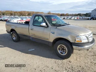 1999 Ford F-150 XL с VIN 1FTRF17L2XKA36749, выставлен на аукционе Copart как лот 84671444 с пробегом 148 338 миль миль и Списание • Salvage title. История ставок и продаж доступна на DreamBid. Изображение 4.
