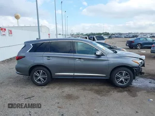 2020 Infiniti QX60 Luxe z VIN 5N1DL0MNXLC523376, wystawiony jako IAAI lot #41189601 z przebiegiem 47 655 mil mil oraz . Historia ofert i sprzedaży dostępna na DreamBid. Obrazek 14.