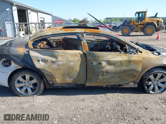 2011 Buick LaCrosse CXL z VIN 1G4GC5ED9BF120552, wystawiony jako IAAI lot #42219711 z przebiegiem Nie podano mil oraz . Historia ofert i sprzedaży dostępna na DreamBid. Obrazek 13.