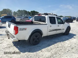 2007 Nissan Frontier SE with VIN 1N6AD09U97C464179, listed as a Copart auction lot 62142395 with 294,908 mi miles and Salvage title. Bid and sale history available at DreamBid. Image 3.