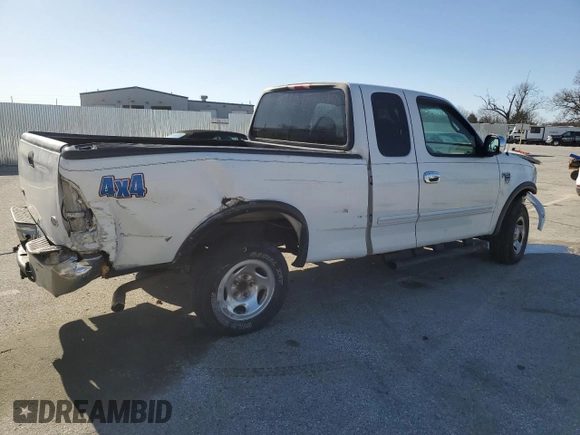 2000 Ford F-150 XL with VIN 1FTRX18W5YKB13685, listed as a Copart auction lot 48286865 with 249,053 mi miles and Salvage Title. Bid and sale history available at carsss.com. Image 3.