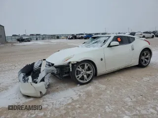 2009 Nissan 370Z z VIN JN1AZ44E59M410339, wystawiony jako Copart lot #45577385 z przebiegiem Nie podano mil oraz Szkoda całkowita • Salvage title. Historia ofert i sprzedaży dostępna na DreamBid. Obrazek 1.