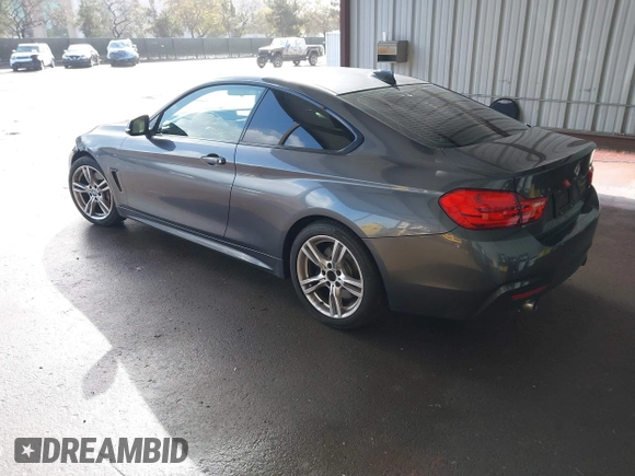 2015 BMW 4 Series 435i with VIN WBA3R1C59FK194649, listed as a IAAI auction lot 41565414 with 123,702 mi miles and . Bid and sale history available at DreamBid. Image 3.
