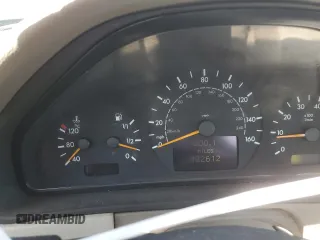 2000 Mercedes-Benz E-Class with VIN WDBJF65J1YB151080, listed as a Copart auction lot 54421955 with 392,612 mi miles and Salvage Title. Bid and sale history available at carsss.com. Image 9.