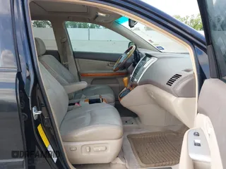 2008 Lexus RX with VIN 2T2HK31U38C064322, listed as a IAAI auction lot 42074366 with 241,459 mi miles. Bid and sale history available at carsss.com. Image 5.
